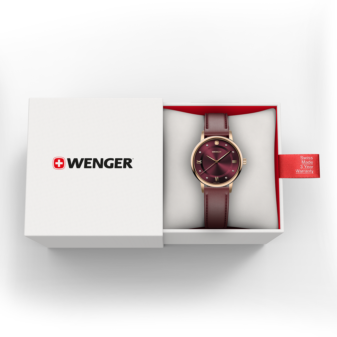Montre Wenger dans une boîte blanche avec une étiquette de garantie rouge.