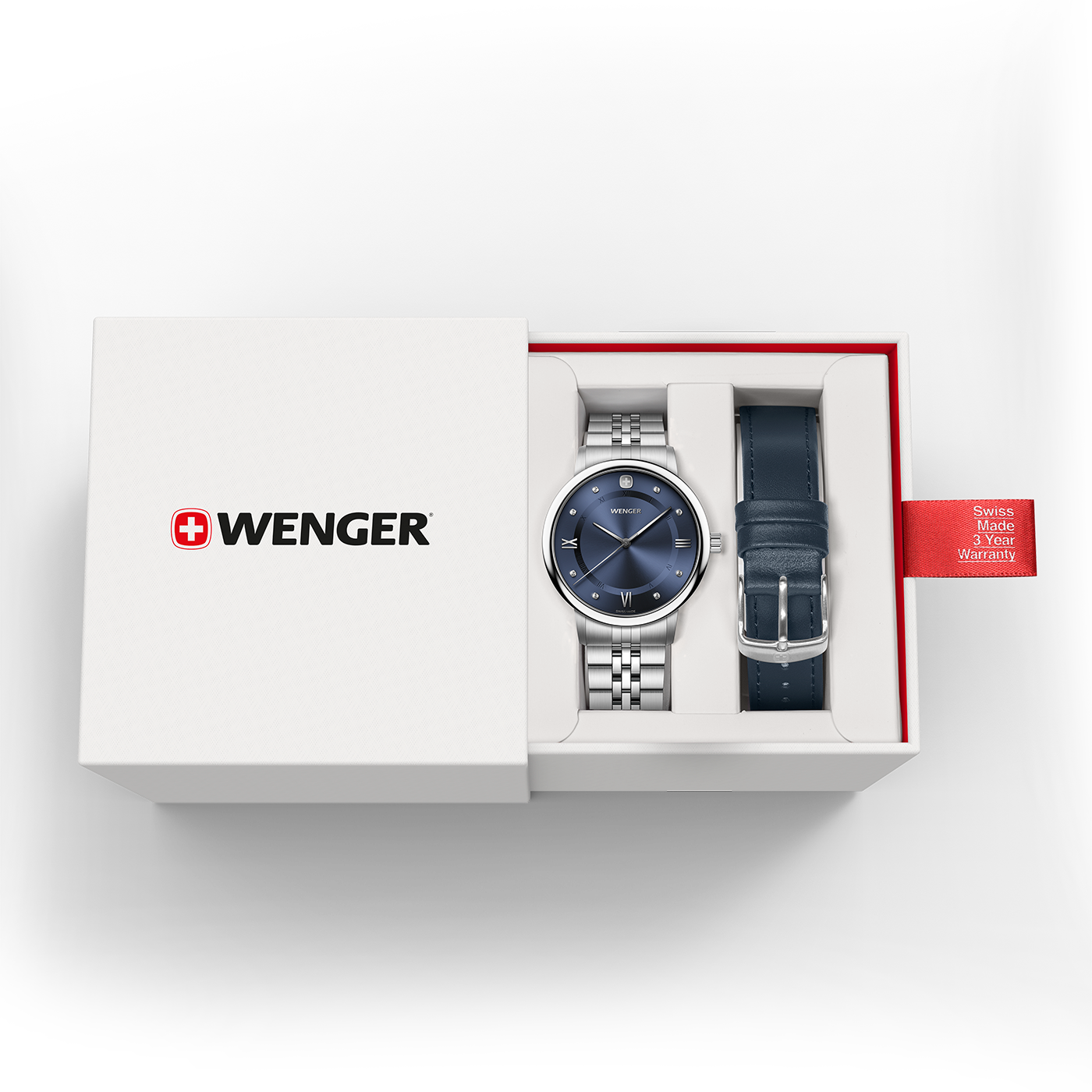 Wenger watch with blue dial and extra navy leather strap in a white gift box with red Swiss Made warranty tag.