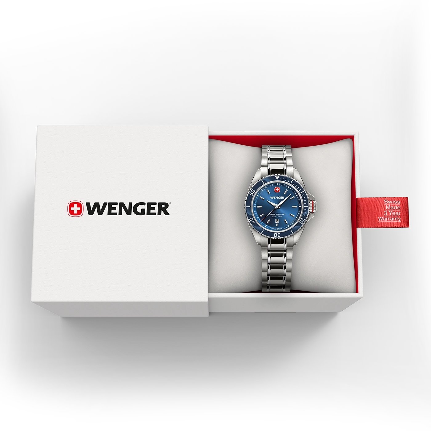 Ein Wenger-Uhr in einer geöffneten Schachtel mit einem roten Garantieband.