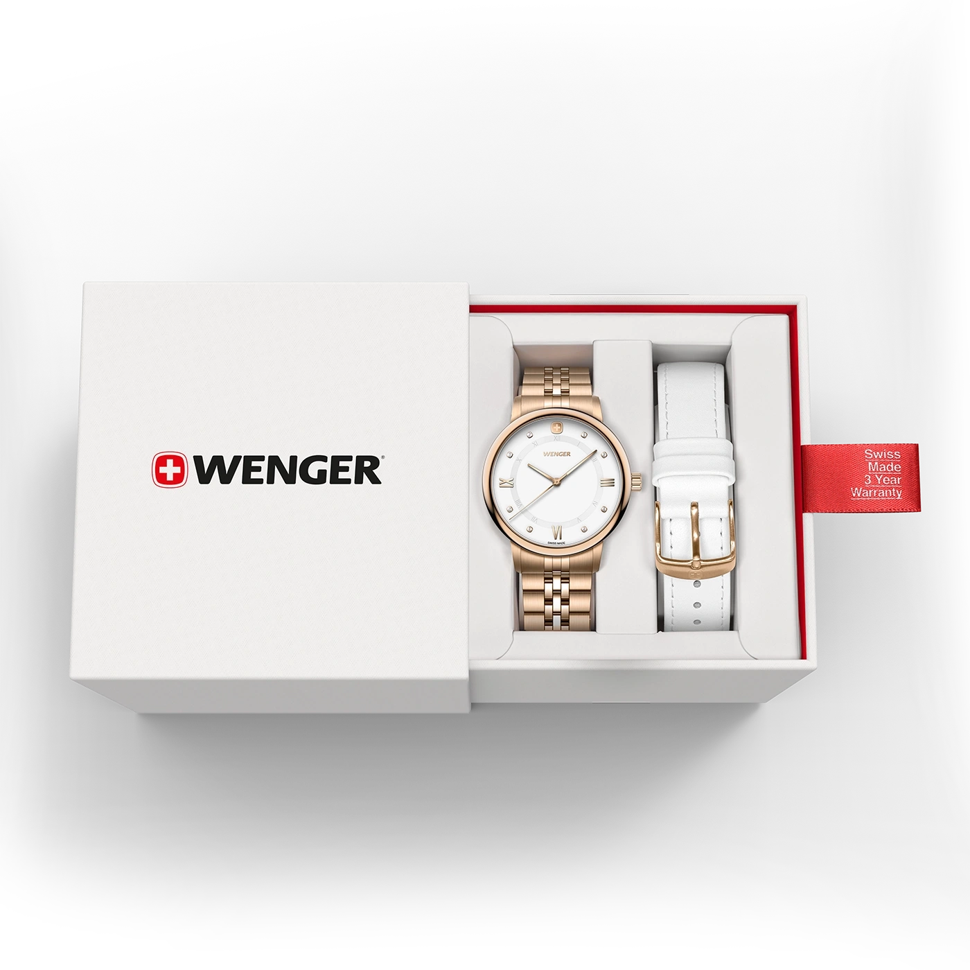 Eine Wenger-Uhr mit zwei Armbändern in einer weißen Geschenkbox.