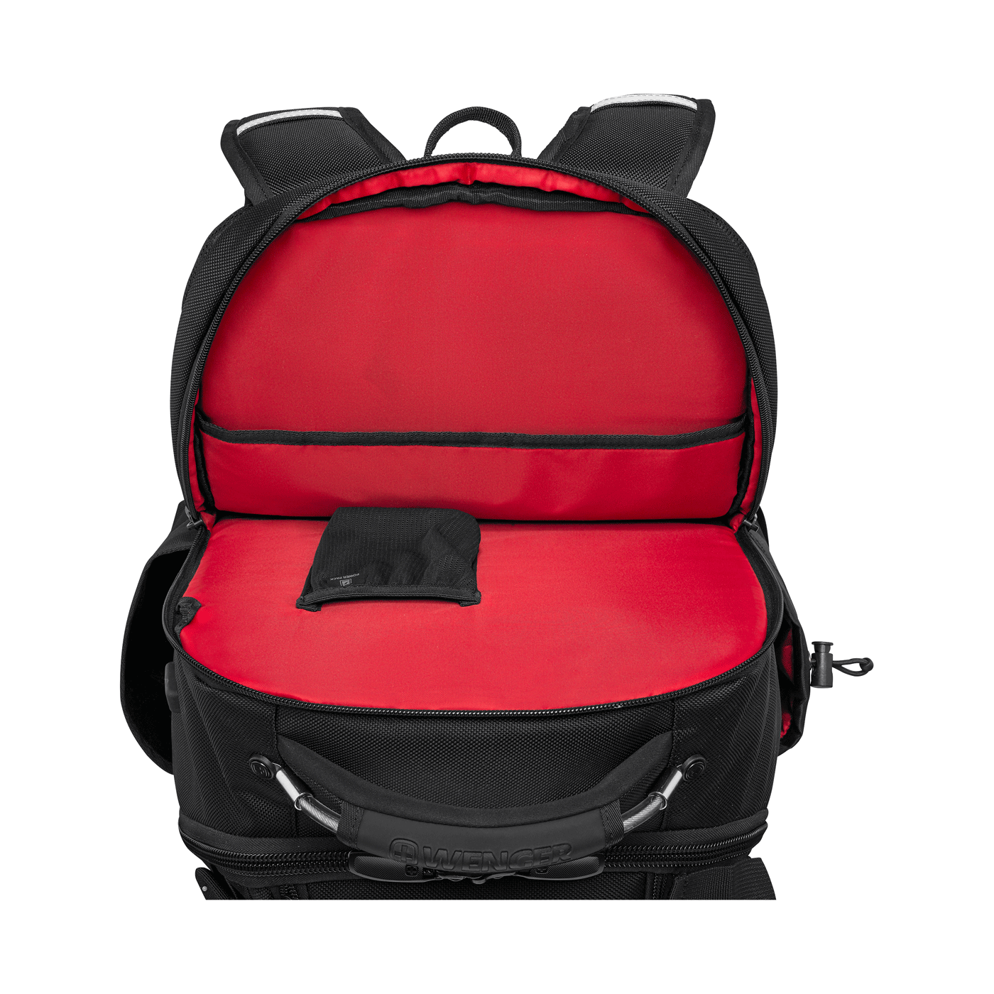 A black backpack with a red interior is open.