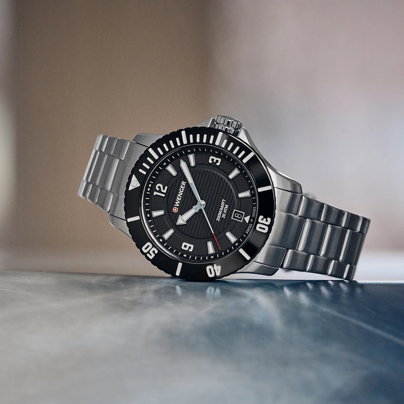 Wenger watch, black dial, stainless steel band, 20 ATM, date, 12, 3, 6, 9, 40, 50, Swiss Made